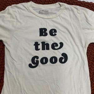 Graphic Tee ‘Be the Good’ cream colored with black writing